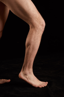 Jamie  1 calf flexing nude side view 0007.jpg